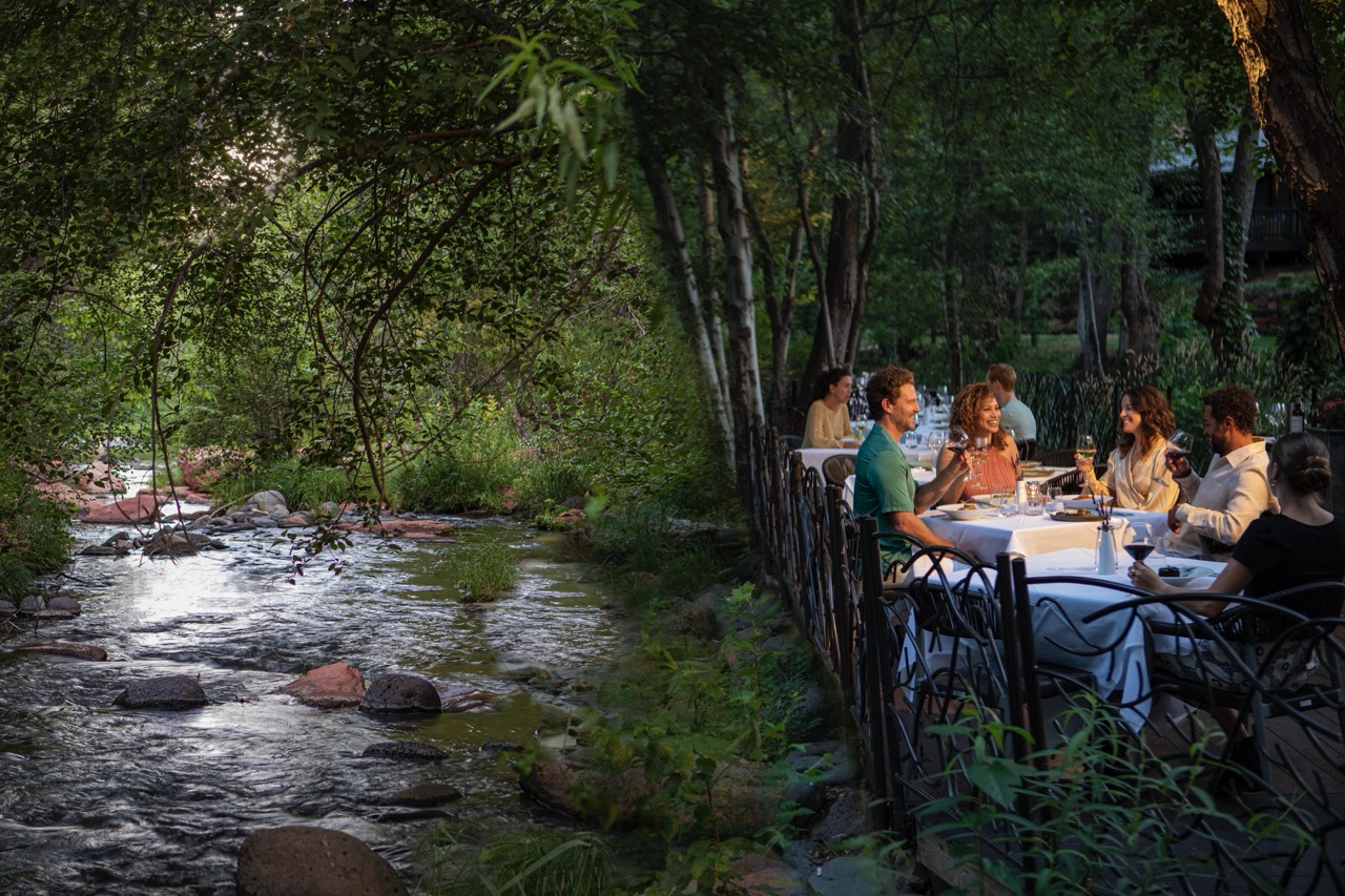 People conversing while dining at the Cress on Oak Creek