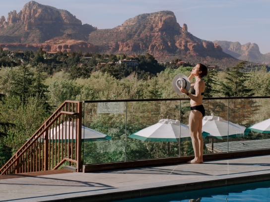 Woman at Duck Pond with View